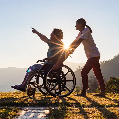 NDIS Continence Assessment in Rosebud – participant outdoors with support worker.