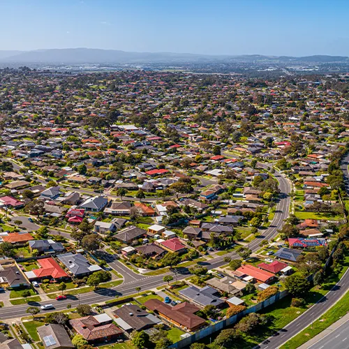 Aerial view of Melbourne suburbs showcasing residential communities, representing A1 Care Group’s wide NDIS service coverage across the region.
